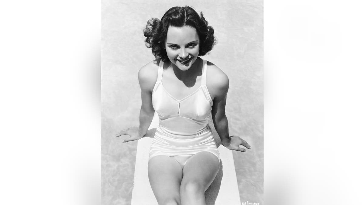 Elizabeth Inglis wears swimsuit in publicity shot