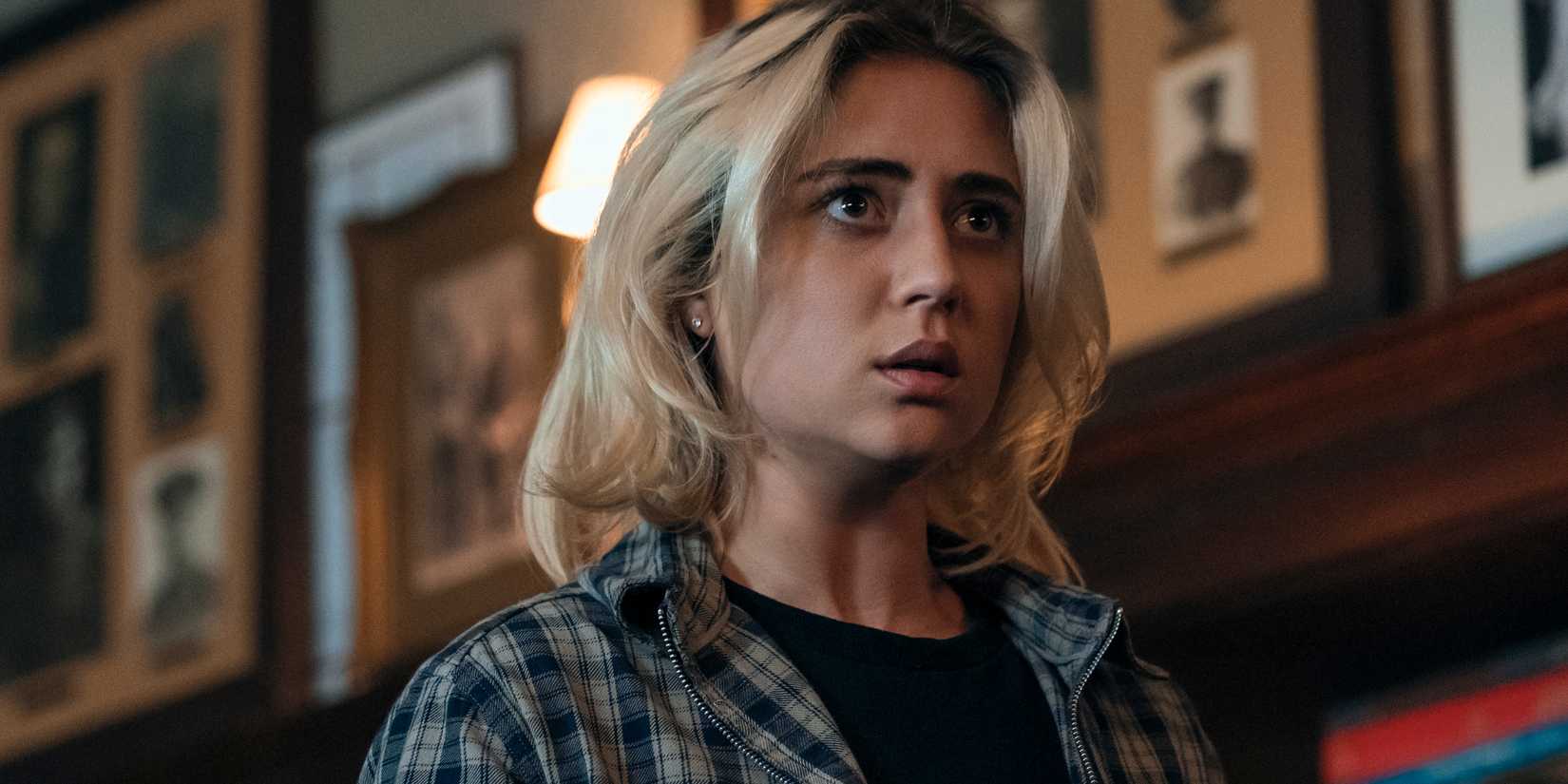 Lizze Broadway as Emma looking at something with a concerned face in Gen V season 2