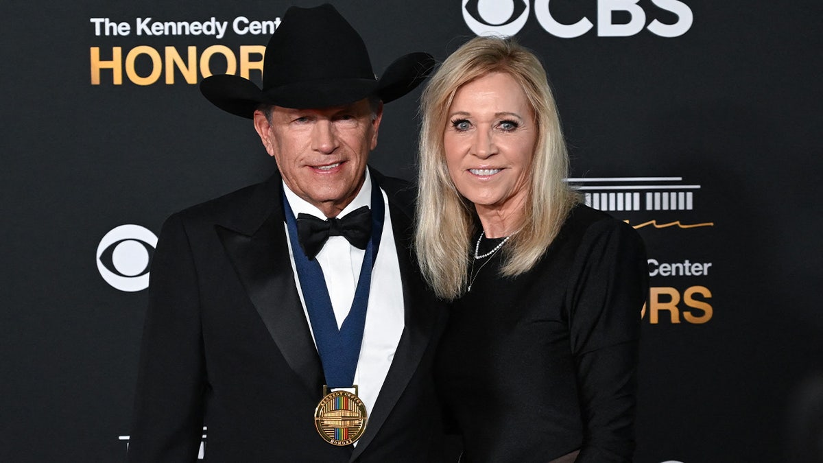 George Strait wears black cowboy hat at Kennedy Center Honors.