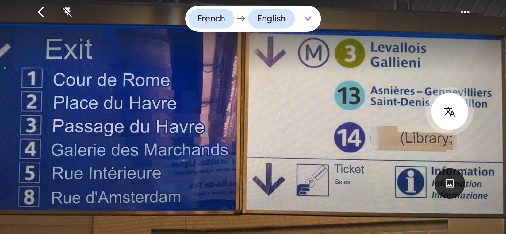 A screenshot of Google Translate in the process of translating a sign in a French Metro station.