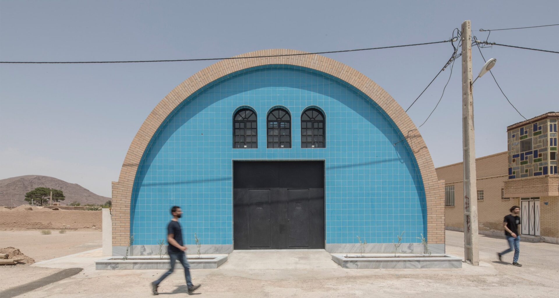 Brick barrel vault shelters community kitchen in Iran by Song Architects