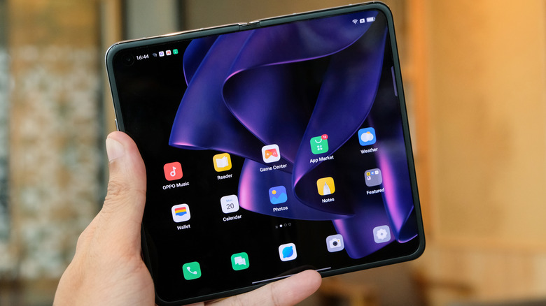 The Oppo Find N in hand.