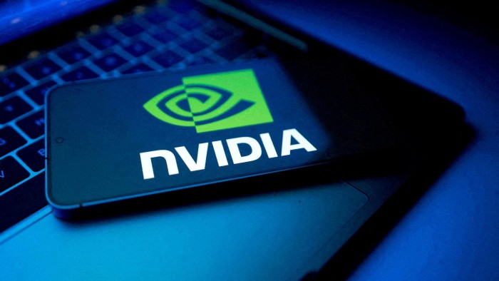 An illustration shows the NVIDIA logo displayed on a smartphone screen resting on a laptop keyboard.