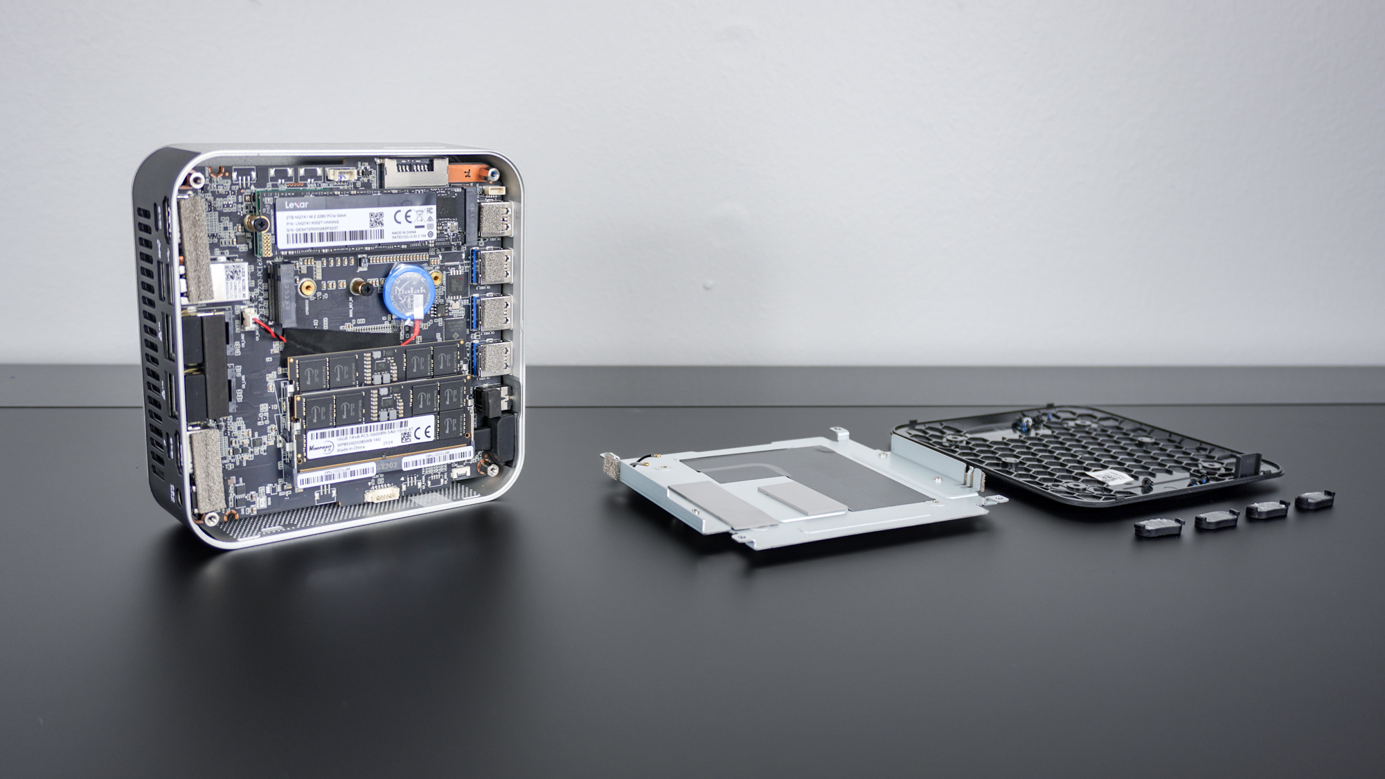 The Geekom A9 Max fully disassembled on a desk