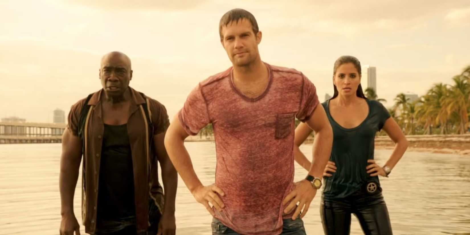 Leo, Isabel and Walter come out of the water in The Finder. 
