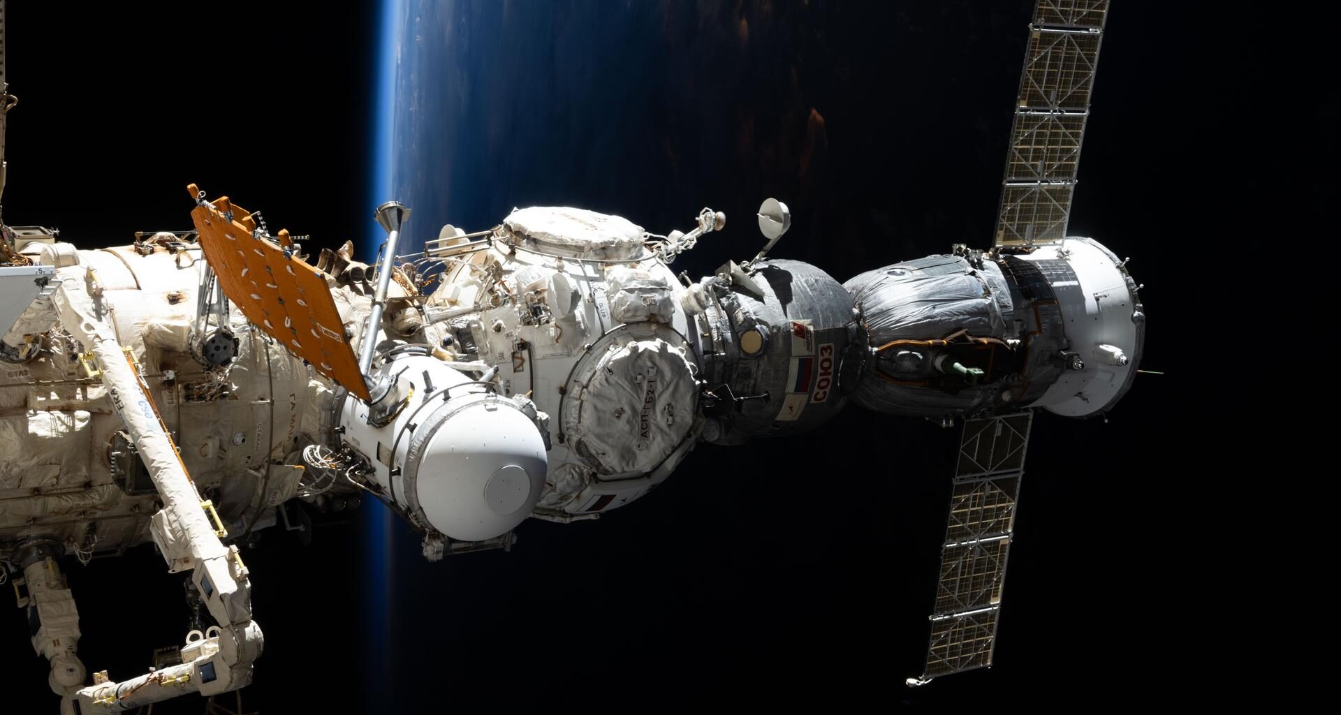 The Soyuz MS-27 spacecraft, which launched three Expedition 73 crew members to the International Space Station, is pictured docked to the Prichal module. Prichal is itself connected to the Nauka science module on the station’s Roscosmos segment. Below, the Pacific Ocean fades from view as an orbital sunset descends 258 miles beneath the orbiting complex.