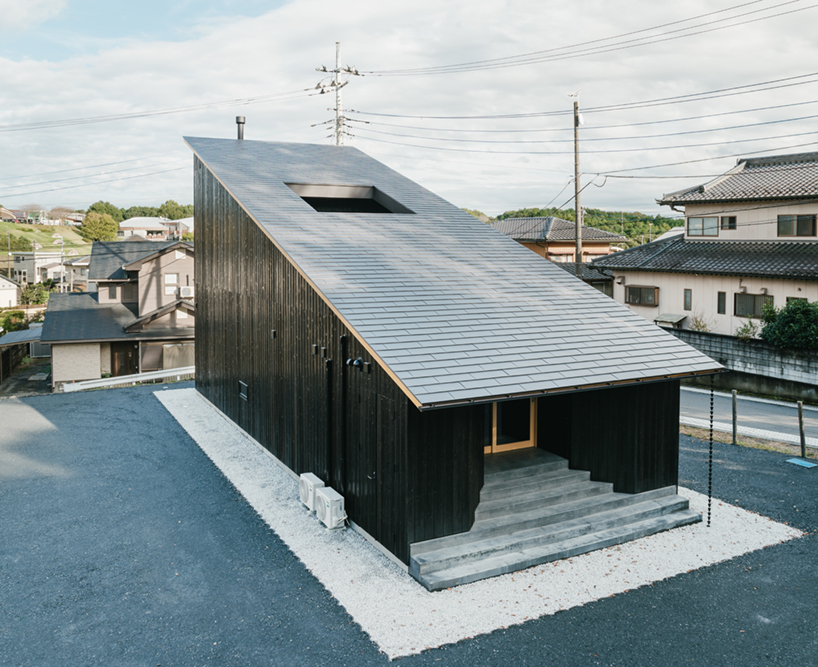 charred cedar facade enfolds kiln-inspired sauna in japan