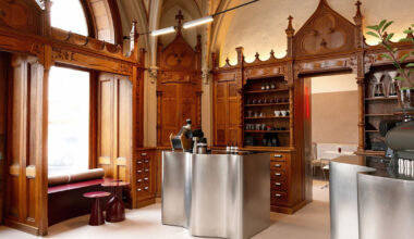 laboratorium café opens within revived neo-gothic apothecary in romania