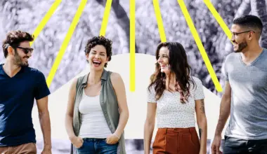 Group of men and women on a hike laughing