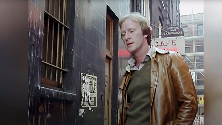 Dennis Waterman as Terry, having just made a date, on Minder