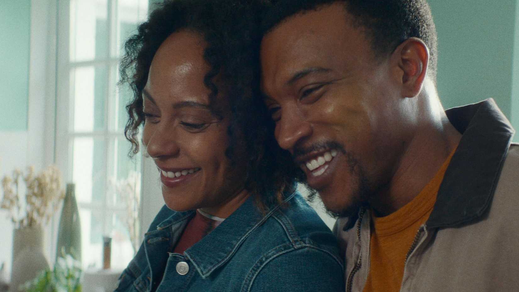 Kat and Josh smiling together in Netflix's Missing You