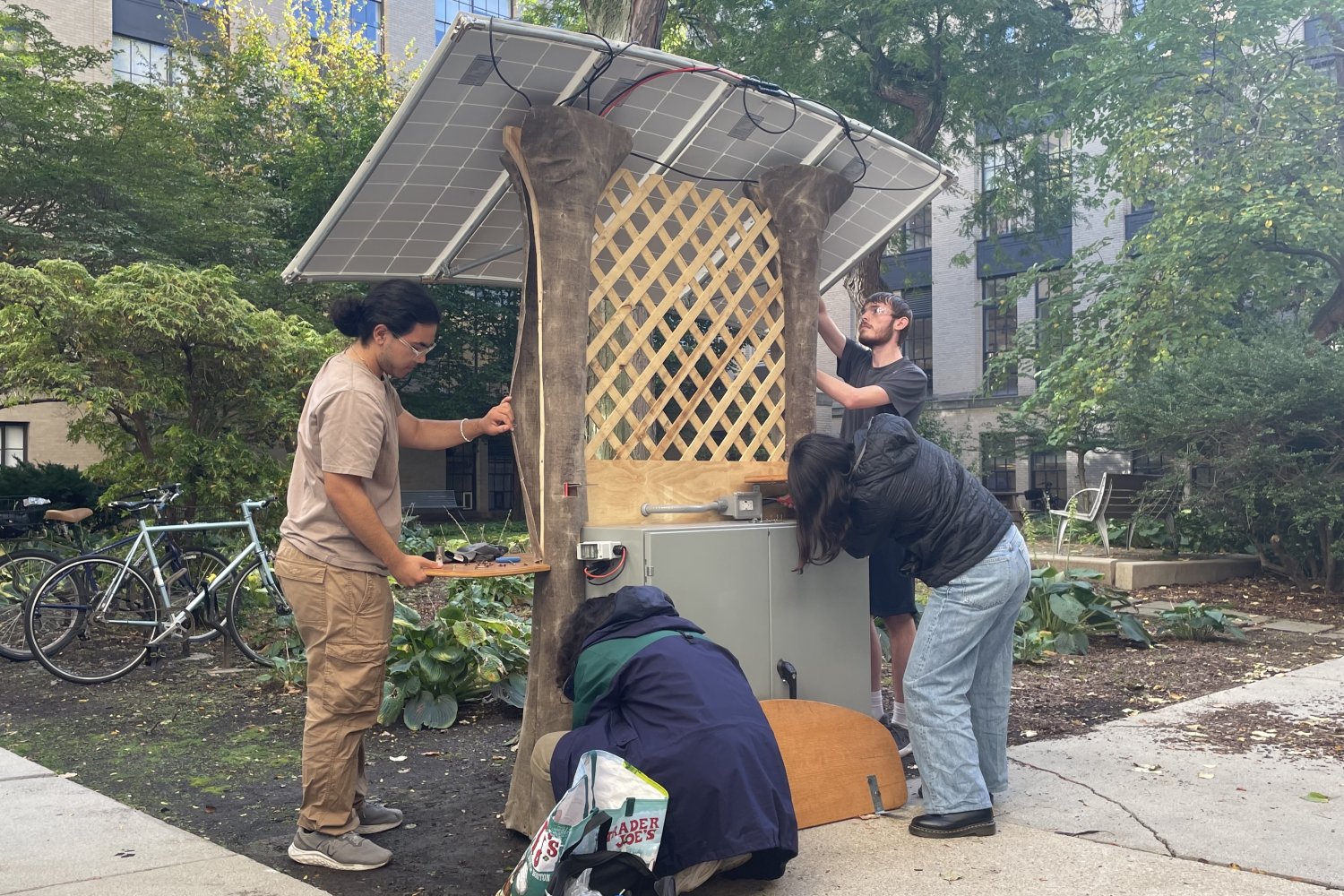 Resurrecting an MIT “learning by doing” tradition: NEET scholars install solar-powered charging station | MIT News