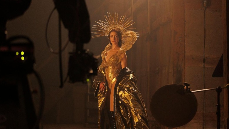 Anne Hathaway as Mother Mary posing in a Beyonce-style halo outfit in Mother Mary (2026)