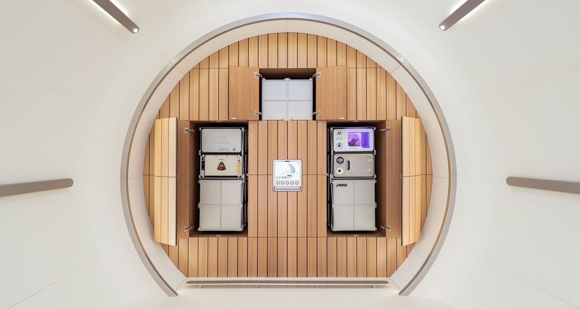 A mockup of the interior of a private space station with different compartments for key areas in the overall round structure