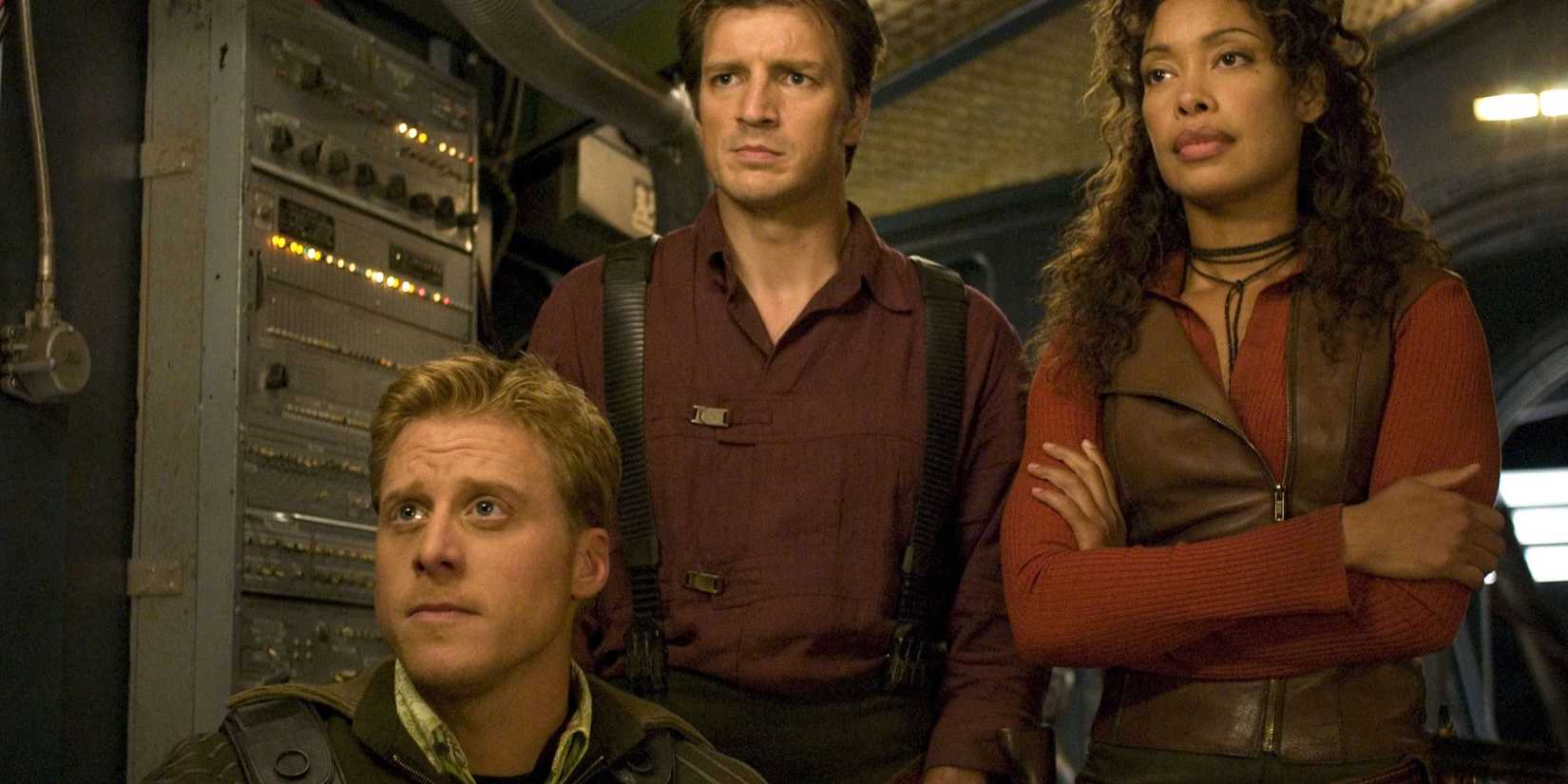 Nathan Fillion as Mal, Gina Torres as Zoe, and Alan Tudyk as Wash on the Serenity in Firefly