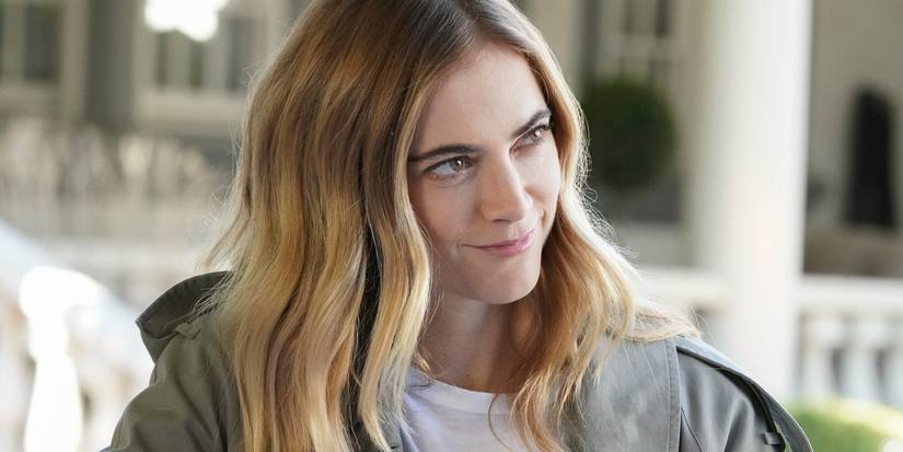 A close-up of Ellie Bishop (Emily Wickersham) smiling on NCIS