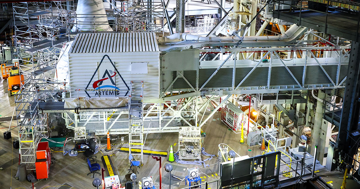 Artemis adornment: NASA paints program logo on launch gantry white room