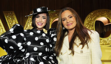 Bronwyn Newport and Meredith Marks posing together during the Spill the Salt Lake Ci-Tea panel at BravoCon 2025.