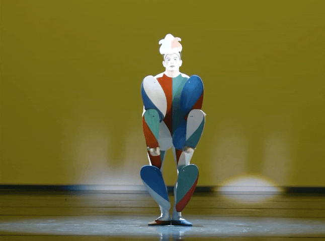 a gif of a robotic dancer in a red, white and blue costume