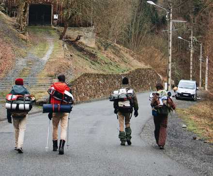 People Walking In The Middle Of The Road