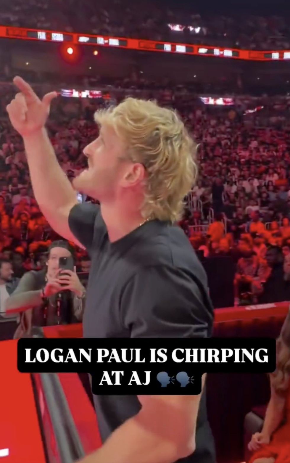 Playing up to the cameras, Logan Paul tried to taunt Anthony Joshua from ringside