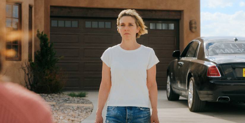 Rhea Seehorn standing outside her house in Pluribus Episode 7