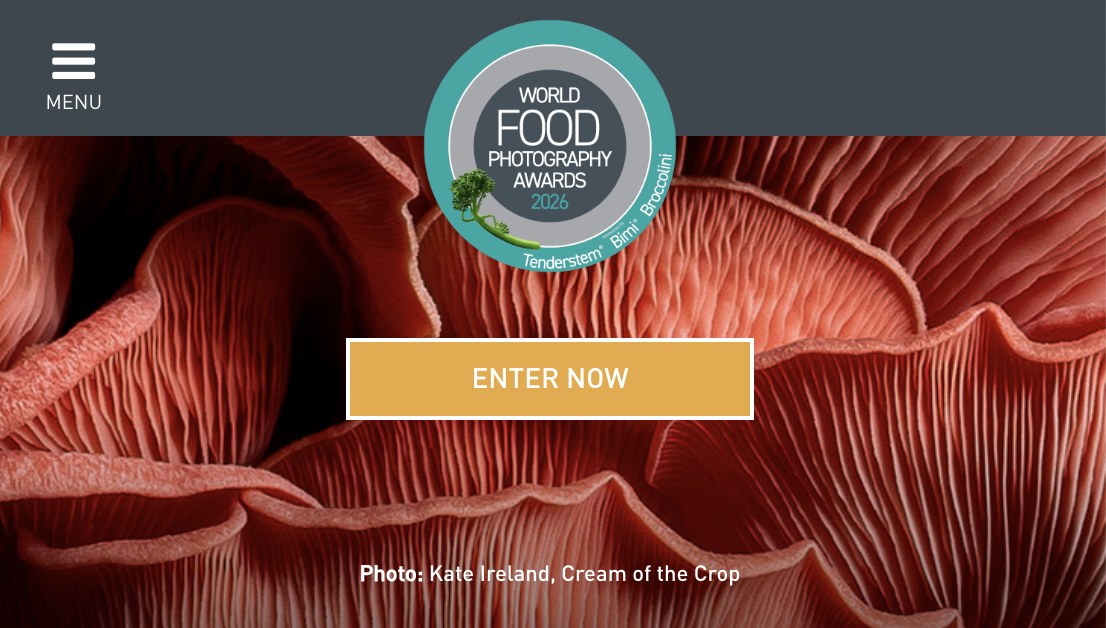 A banner for the World Food Photography Awards 2026, featuring a close-up photograph of the intensely ribbed, pink underside of a mushroom, with a circle logo and an "ENTER NOW" button overlaid.