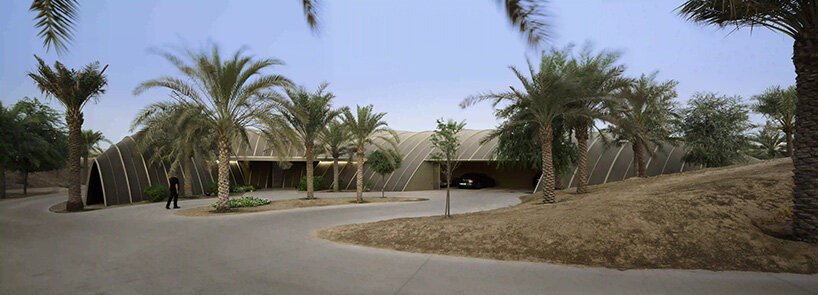 RCR arquitectes' house rises like a blooming structure of ribbed petals in the dubai desert