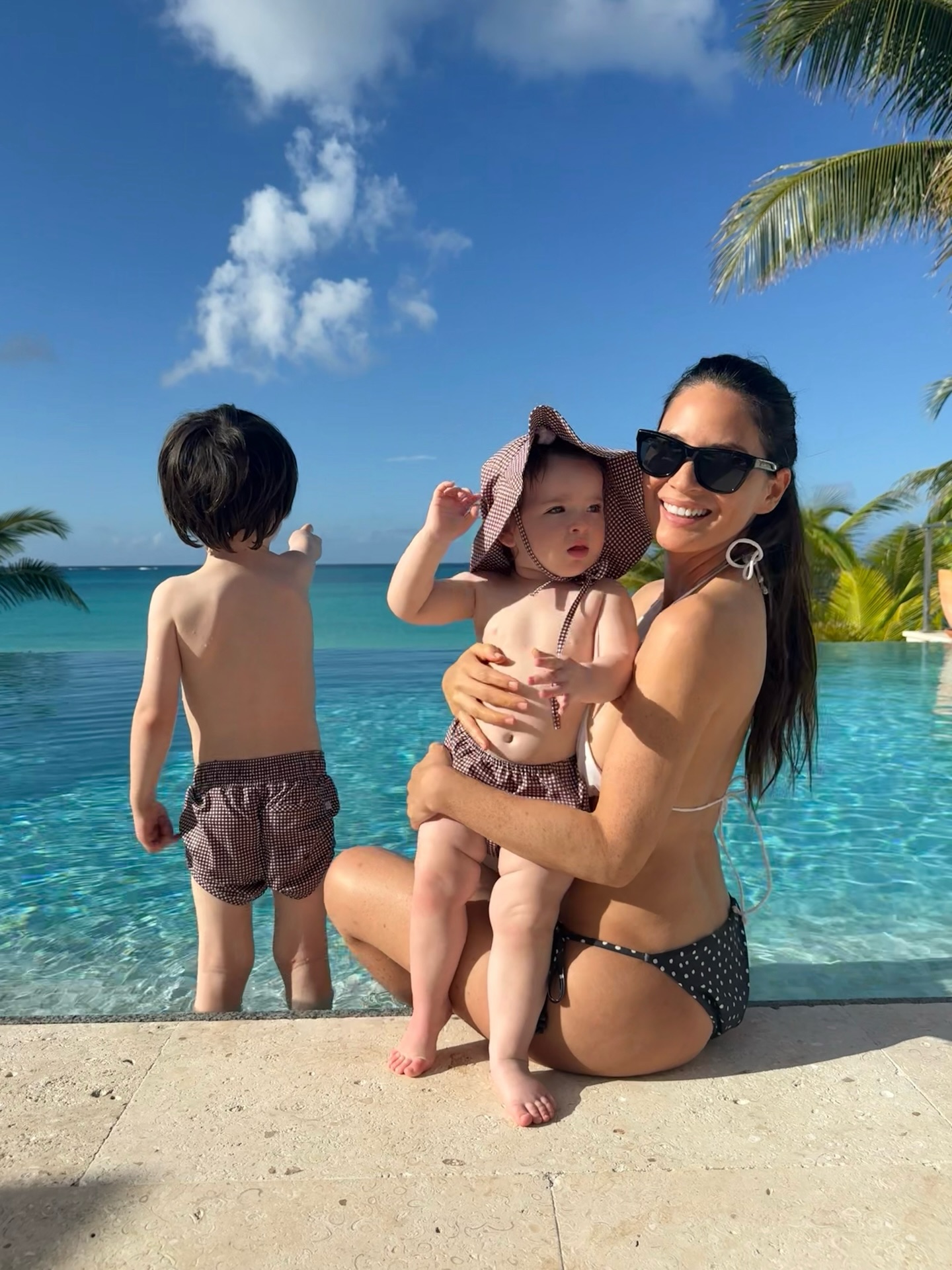 Olivia Munn and her two kids, Malcolm,  4, and Méi, 1, grab their beach bags and sunscreen for a day of family fun.