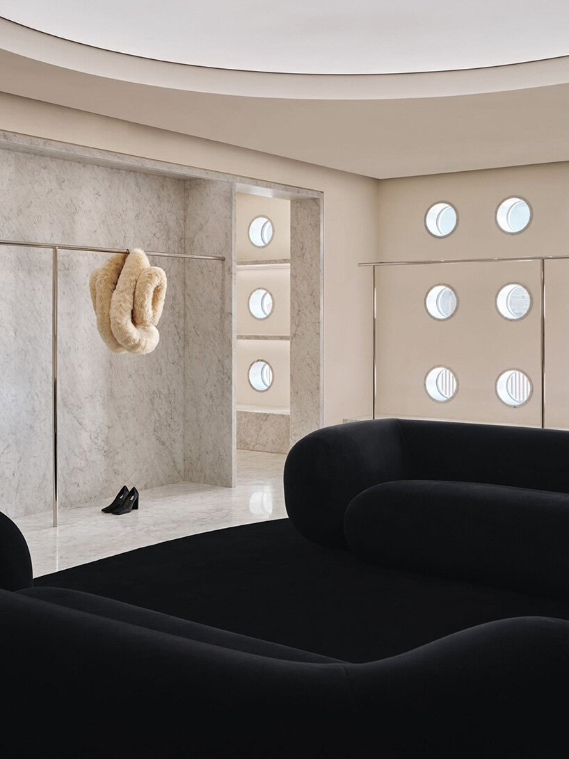 sculptural marble facade by halleroed fronts alaïa's first china flagship in beijing