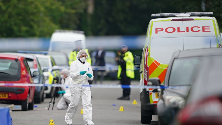 Forensics officers outside the Obinim home. Pic: PA