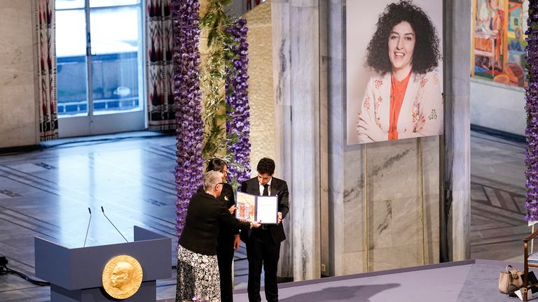 Ali and Kiana Rahmani receive the 2023 Nobel Peace Prize for their mother, Narges Mohammadi. Pic: AP.