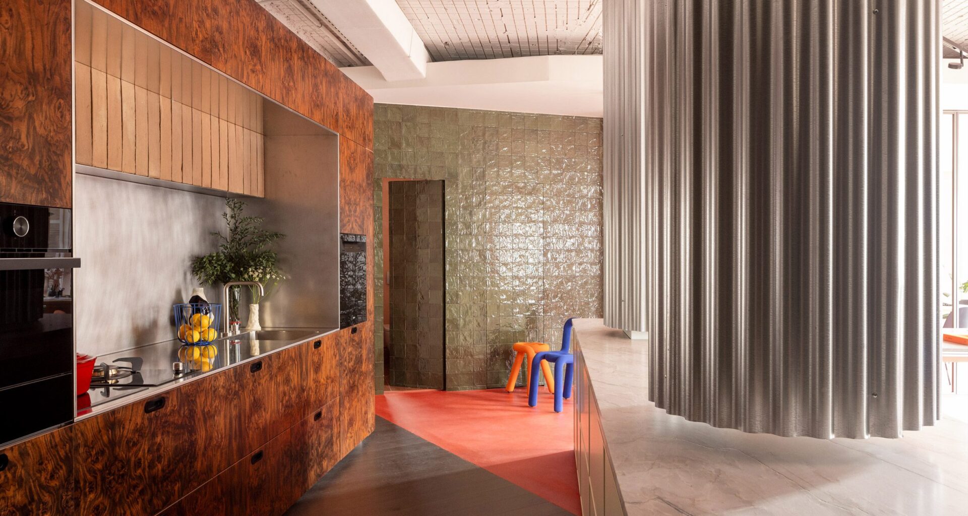 Tabula Studio combines red floors and trompe l'oeil details in Bilbao office