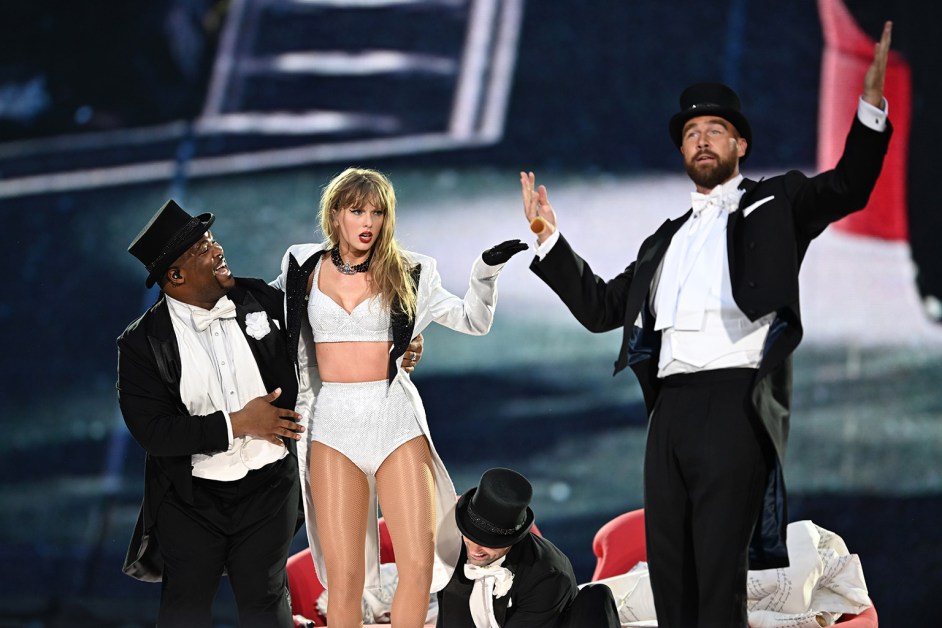 Taylor Swift is joined on stage by Travis Kelce (R), during "Taylor Swift | The Eras Tour" at Wembley Stadium on June 23, 2024 in London, England. (Photo by Gareth Cattermole/TAS24/Getty Images for TAS Rights Management )