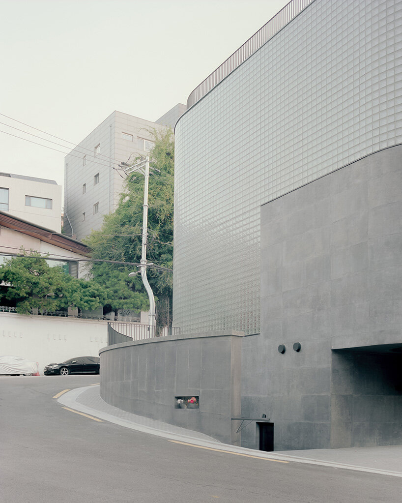 stocker lee architetti wraps MANMADE seoul with textile-like concrete and glass blocks