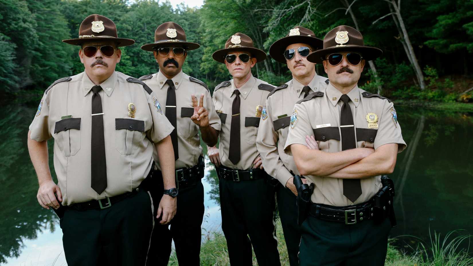 Super Troopers 2's Kevin Heffernan as Rodney 'Rod' Farva, Jay Chandrasekhar as Arcot 'Thorny' Ramathorn, Erik Stolhanske as Robbie 'Rabbit' Roto, Paul Soter as Carl Foster, Steve Lemme as MacIntyre 'Mac' Womack.