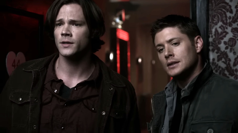 Jared Padalecki's Sam Winchester and Jensen Ackles' Dean Winchester walking together in Supernatural