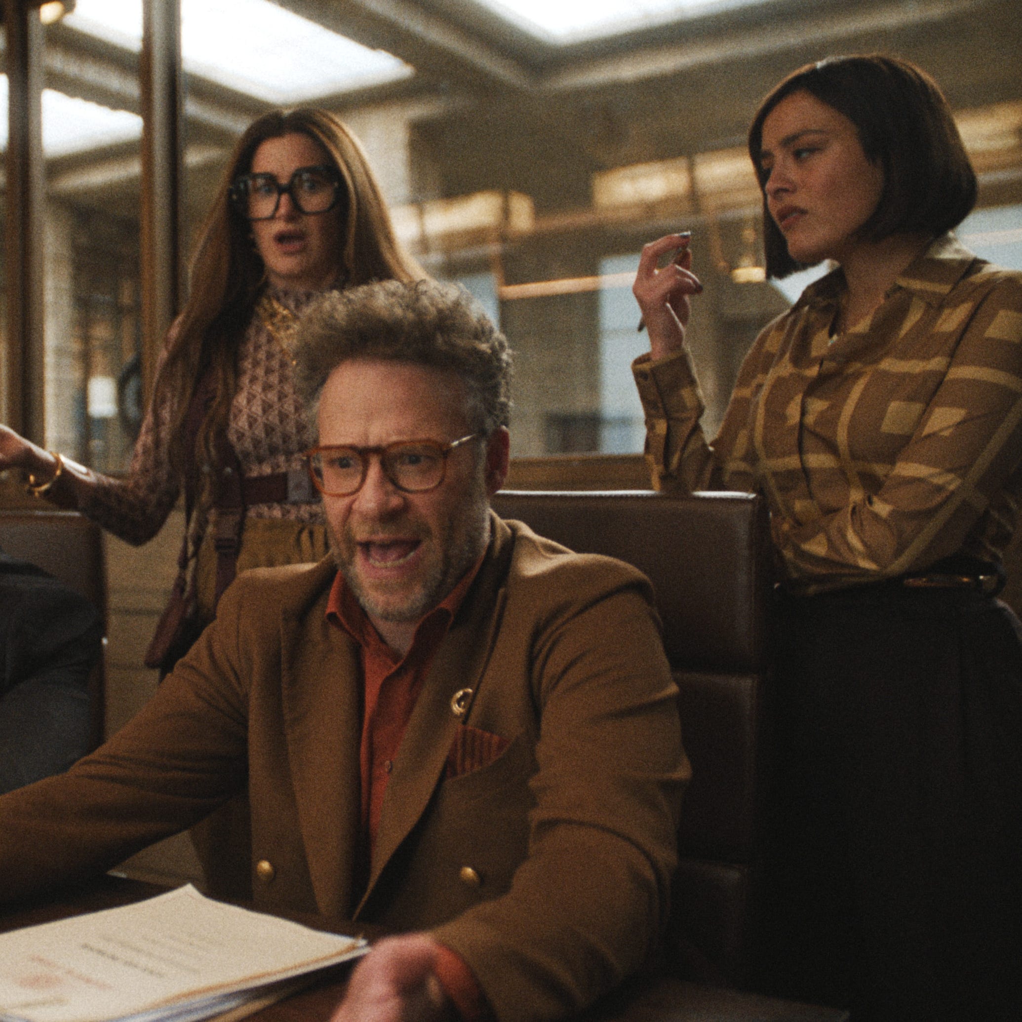 business meeting with multiple participants discussing matters