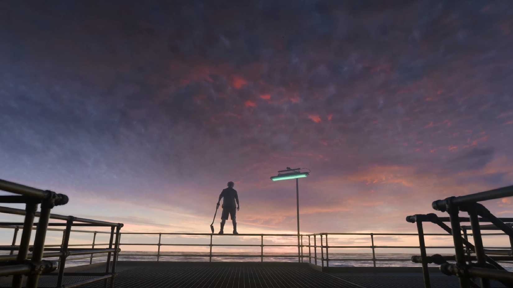 Tom Cruise standing on a railing in Digger