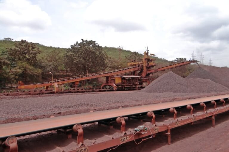 Iron ore mining. Researchers found that the optimal scenario meeting the goals of the Paris Agreement would be to sharpen emissions reductions and adopt high CDR rates till 2100 while continuing conventional reductions. Image via Public Domain.