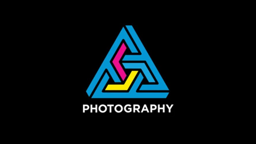 A colorful logo for "APPLIED PHOTOGRAPHY," featuring a stylized, interlocked triangular design in cyan, magenta, and yellow above the word "PHOTOGRAPHY" in white text on a black background.