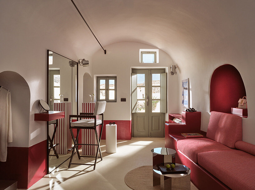 urban soul project redefines the santorini palette through bold red hotel design