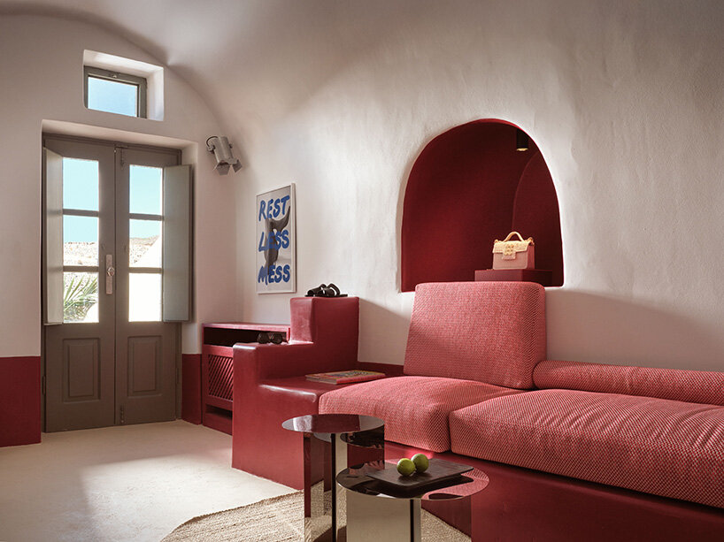 urban soul project redefines the santorini palette through bold red hotel design