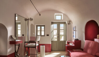 urban soul project brings bold red hotel design to santorini