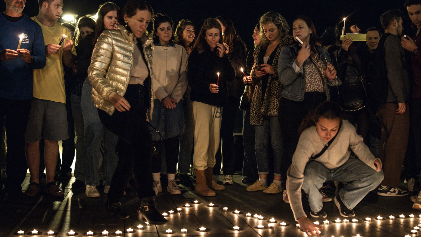 Hanukkah Celebrations in Israel Clouded by an Attack Far Away - NPR