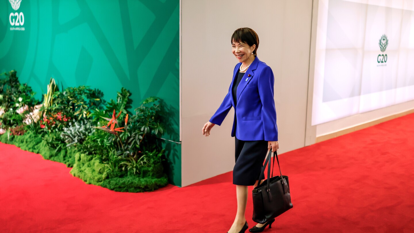 Japan's Takaichi wins fans with style and 'work, work, work' mantra