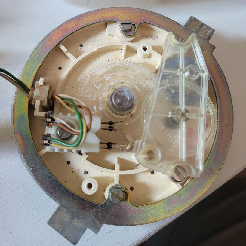 vintage rotary telephone transforms into analog-digital hybrid music player and AI voice chat