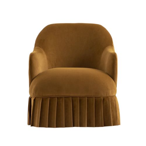 Rust colored skirted armchair