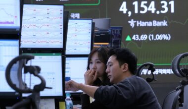 Asian shares track US stock market's rise to record highs despite AI bubble worries
