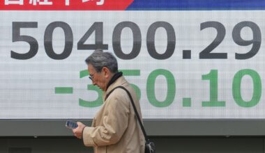 Asian shares are mixed in quiet holiday trading after a lackluster post-Christmas day on Wall St